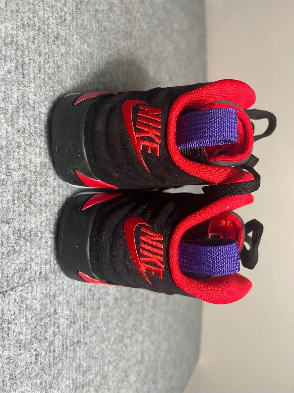 Nike Kids Black and Red High-Top Sneakers with Purple Pull Tabs